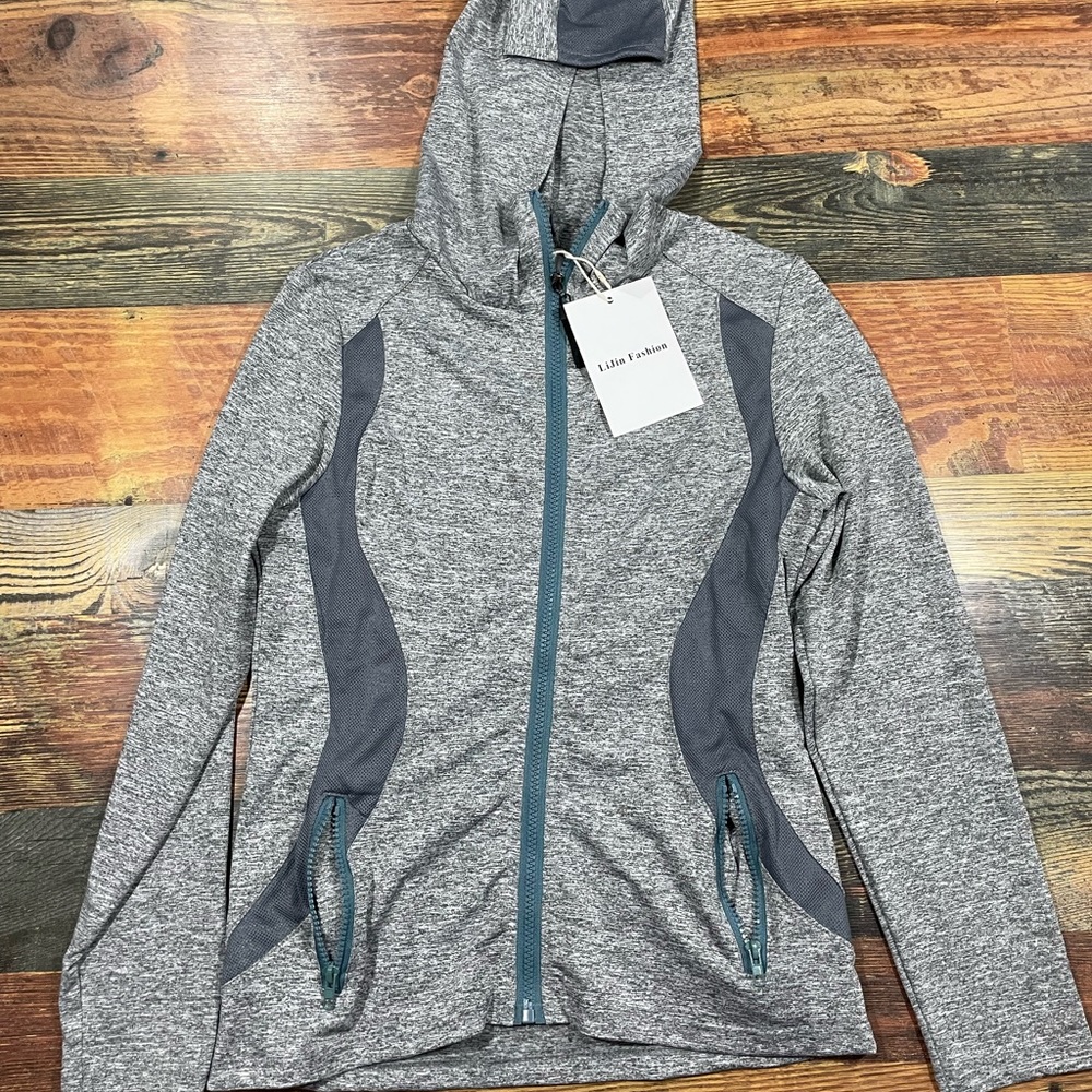 Never worn zip up jacket (large)